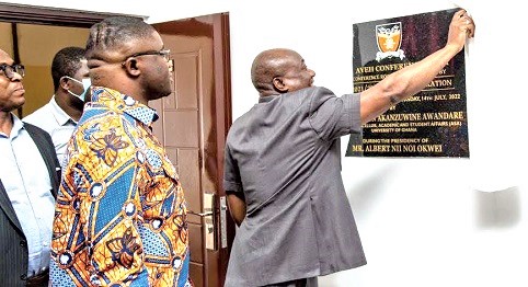 Professor Gordon A. Awandare (right), the Pro Vice-Chancellor for Academic and Students Affairs, unveiling the plaque to officially open the conference room Professor Gordon A. Awandare (right), the Pro Vice-Chancellor for Academic and Students Affairs, unveiling the plaque to officially open the conference room